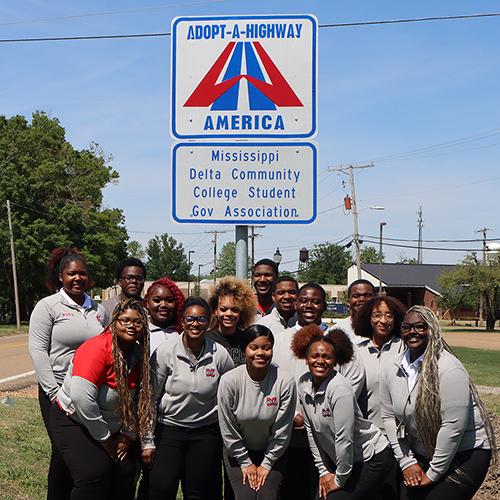 SGA with the MDCC Adopt-A-Highway sign