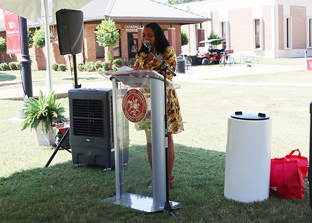 Dr. Sharelle Grim speaking at ceremony