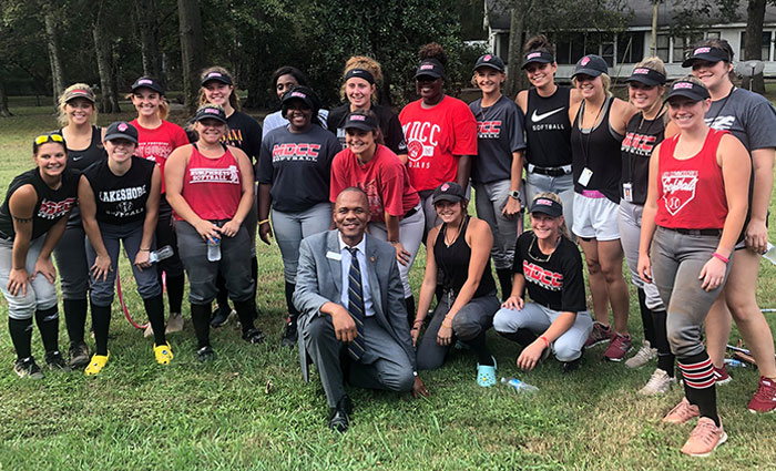 Dr. Jackson with Trojan Softball team